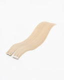 Honey Blonde (#630) Tape-In Extension (30g-70g)